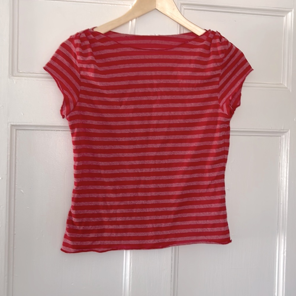 Red striped T-shirt, lettuce hemming on sleeve, bottom and neckline. Size small.